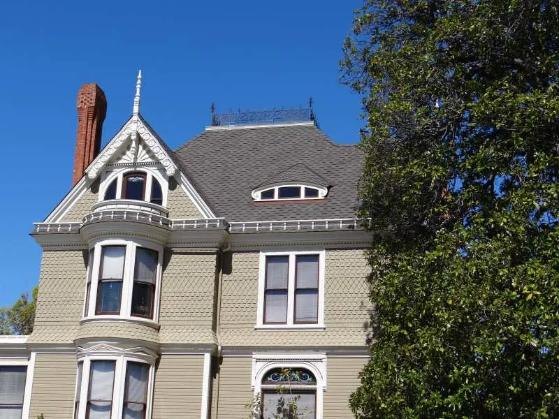 Gables and dormers of a historic home with new shingles