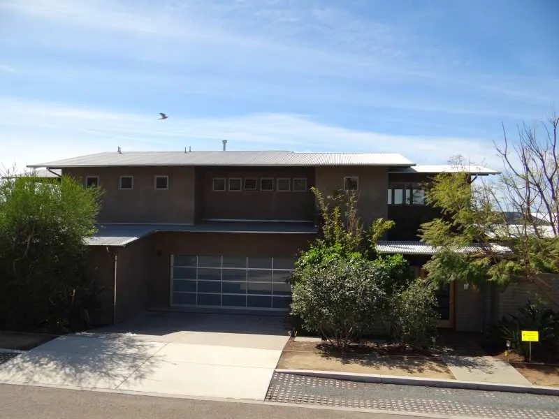 A La Costa home with a corrugated Galvalume metal roof